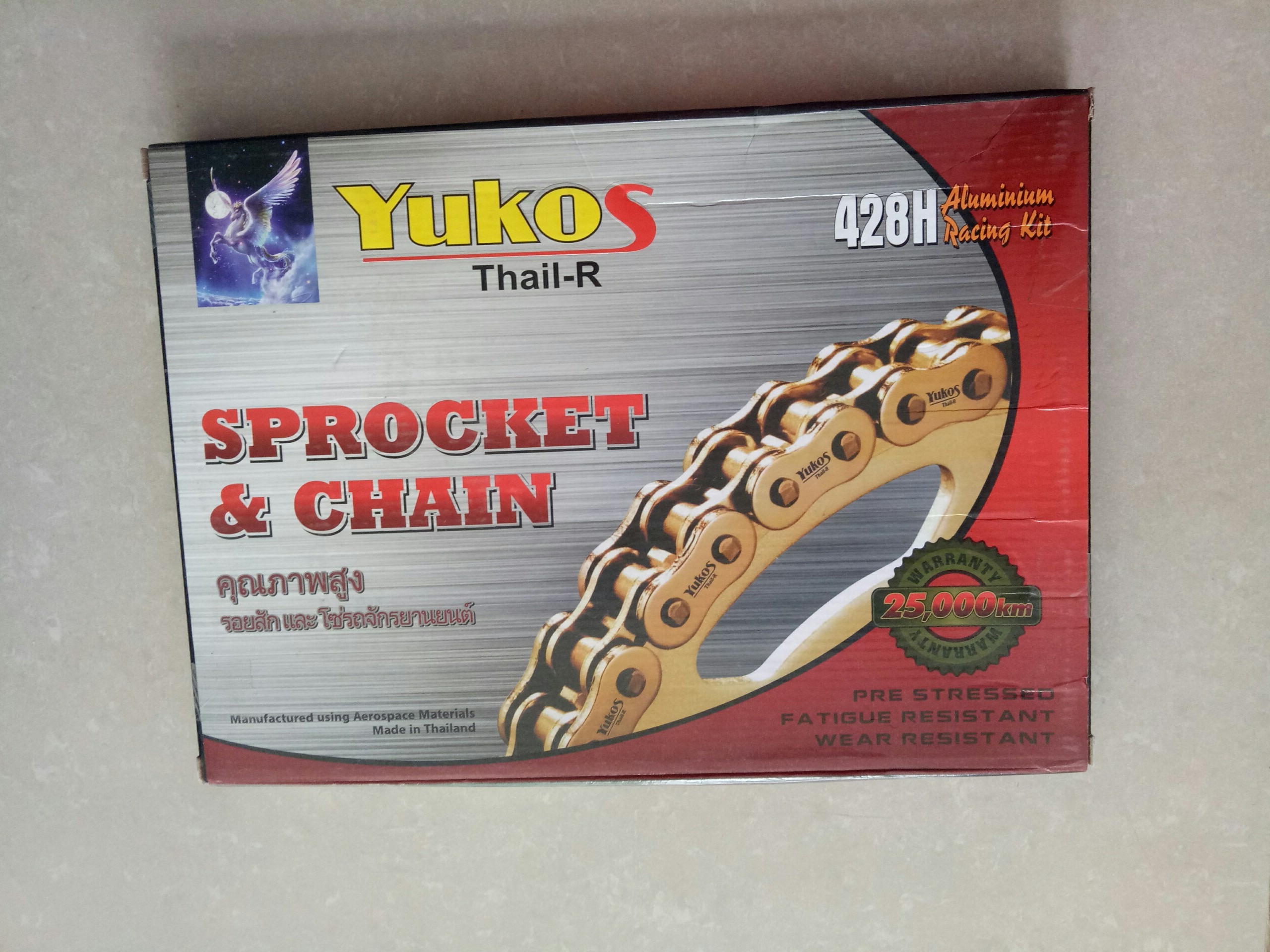 Nhông sên dĩa mạ vàng xe axelo 125 yukos thái lan. sên 10 ly