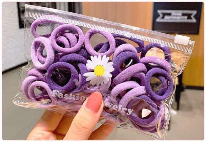 Sét 50 dây chun buộc tóc kèm túi đựng hoa cúc sieu xinh