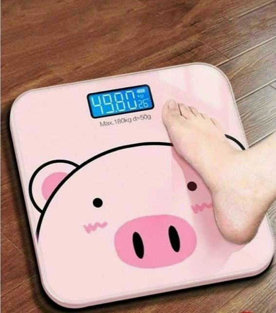 Cân điện tử hình heo hồng