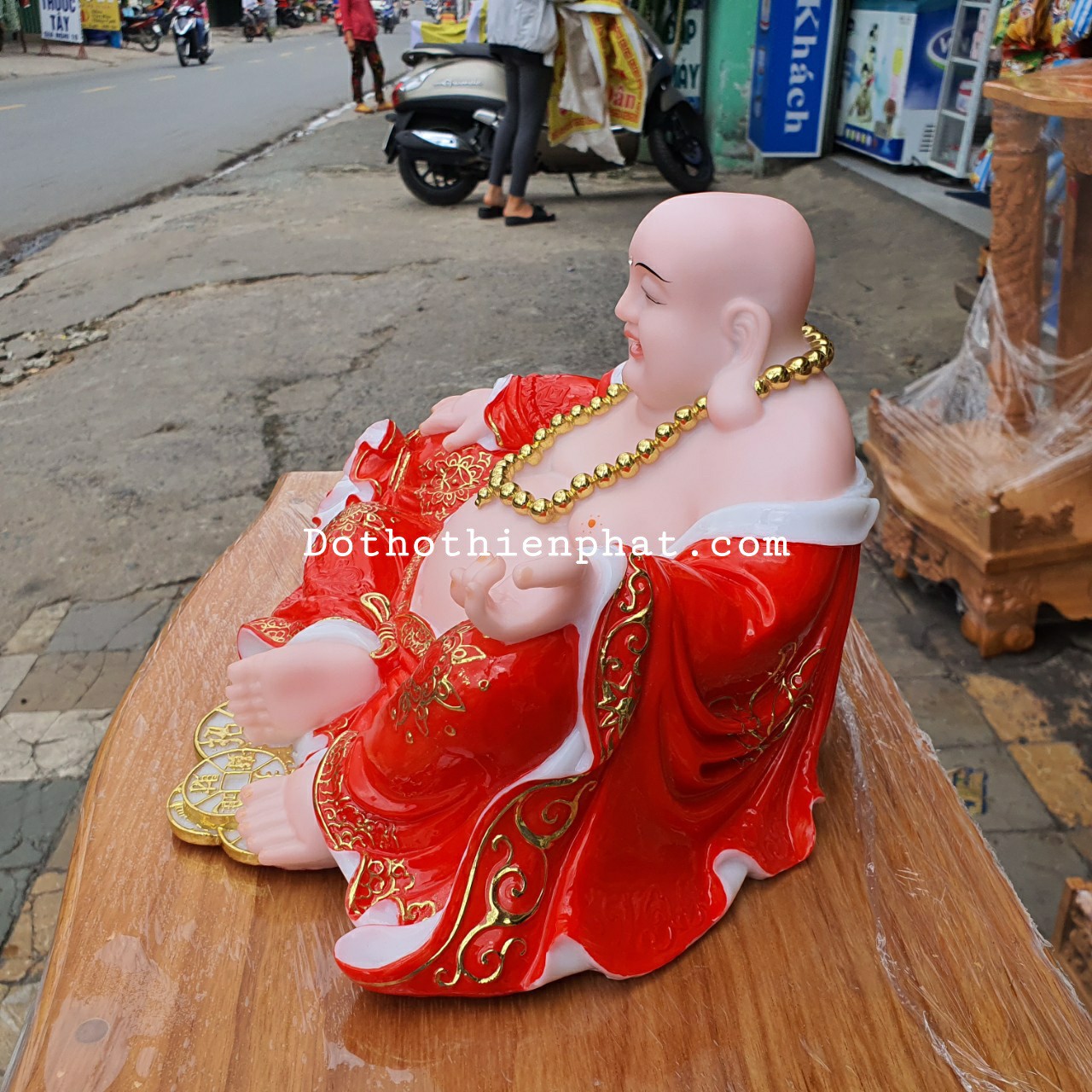 Tượng phật di lặc đá 12in ngang 27 cm màu đỏ rất đẹp
