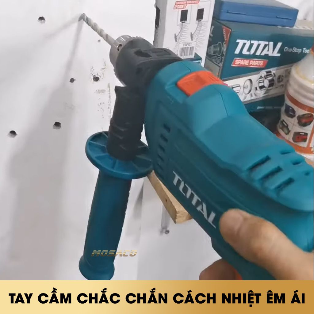 Hammer drill machine 550W total TG105136E switch reversal. Hammer drill machine handheld produced by advanced technology high quality and durability make, there is no load 0 - 3000 vòng/p, drilling capacity maximum 13mm-mosaco
