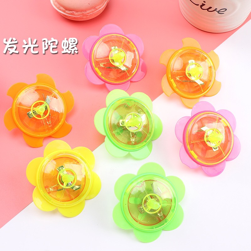 Đồ chơi con quay hoa lốc xoáy có đèn cho bé