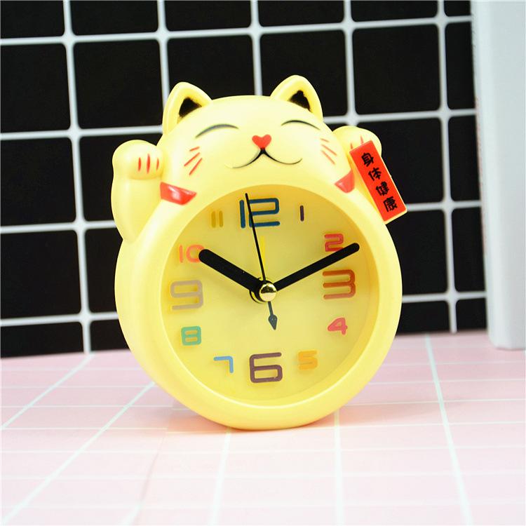Đồng hồ để bàn hình mèo dễ thương (giao màu ngẫu nhiên)