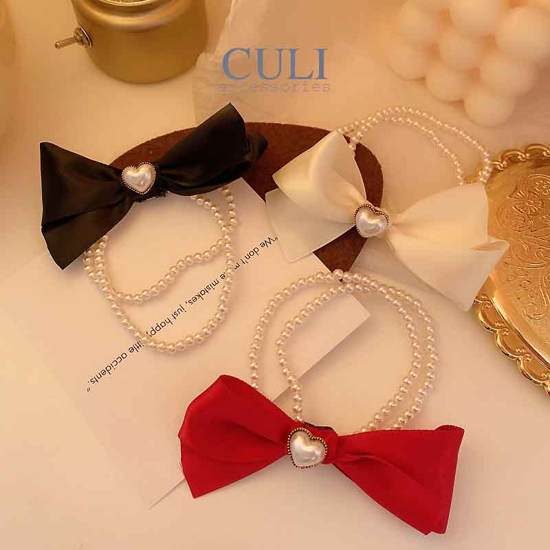 Cột tóc nơ dây ngọc trai xinh xắn