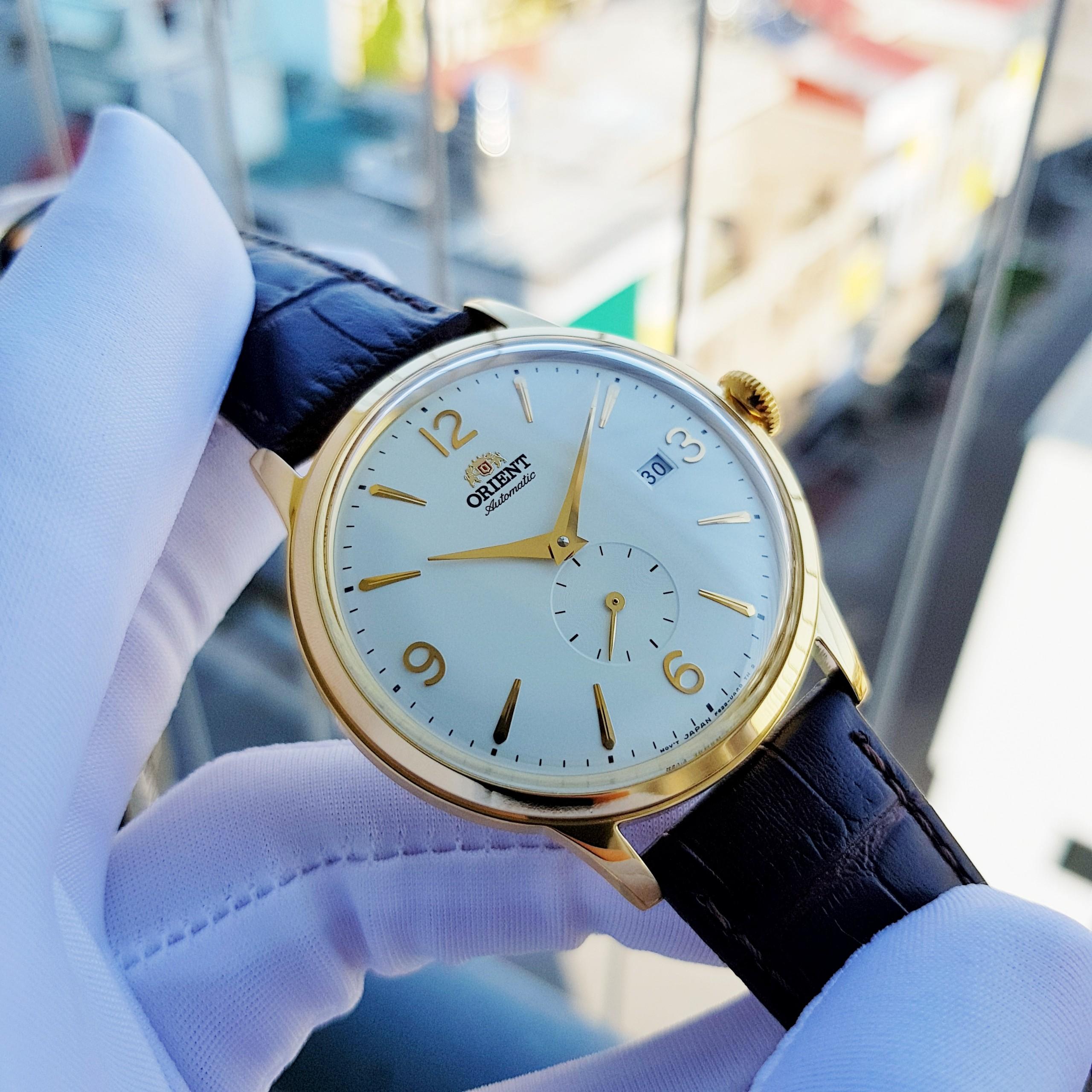 Đồng hồ Nam Orient Bambino Automatic RA-AP0004S10B Mặt trắngViền vàngLịch ngàyKính cứng cong-Máy cơ tự động-Size 40mm