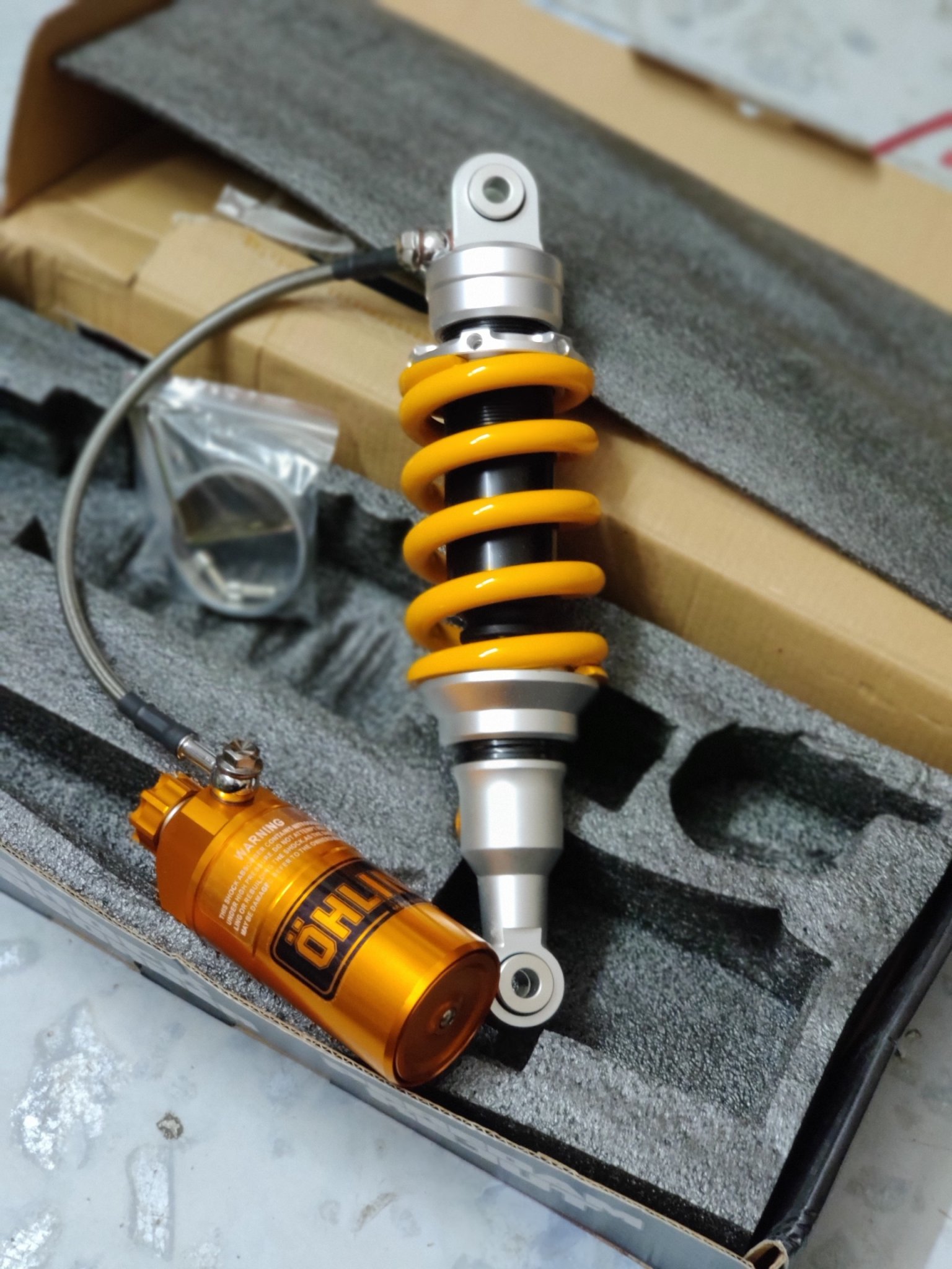 Phuộc nhún sau Ohlins bình dầu Raider Satria