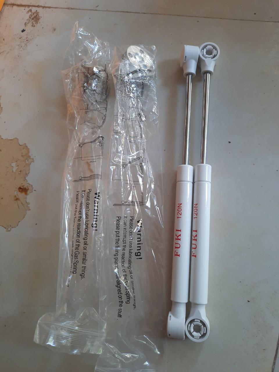 piston nâng cánh tủ bếp( ti hơi)