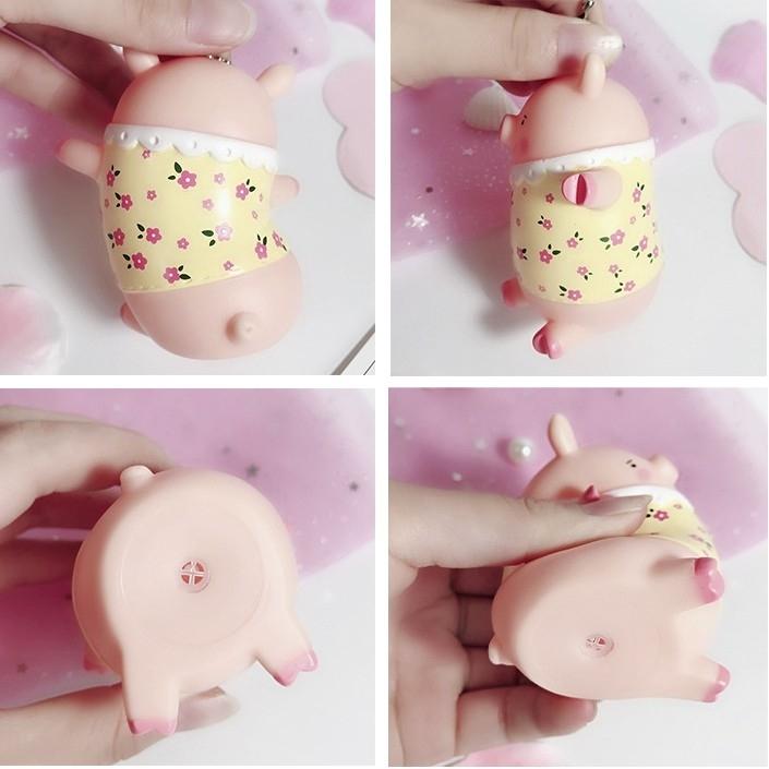 Móc khóa bé heo xoắn
