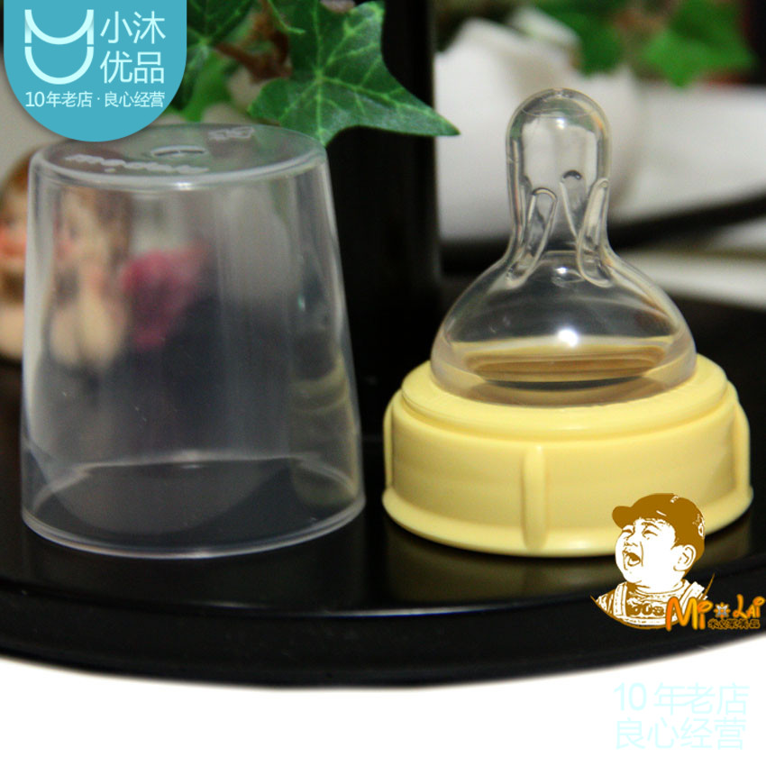 Bộ núm ti Medela size M kèm nắp