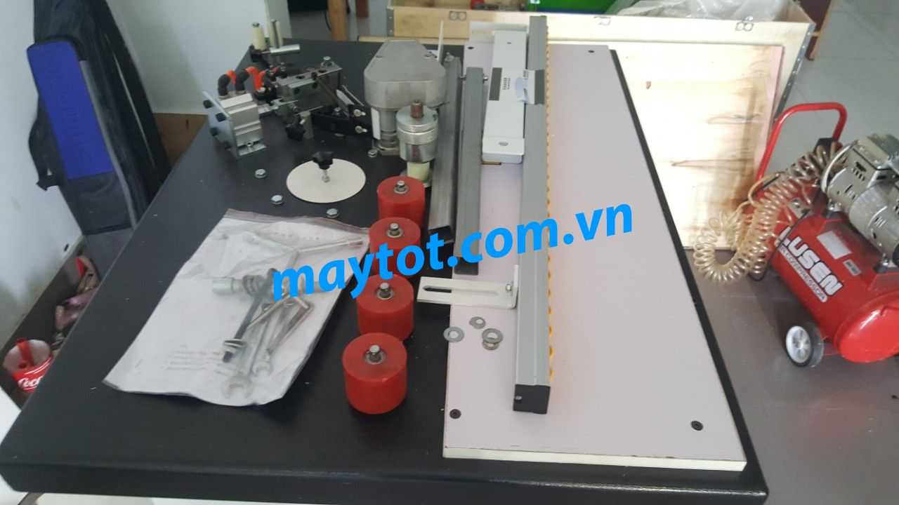 [HCM]máy dán cạnh viền tranh ảnh