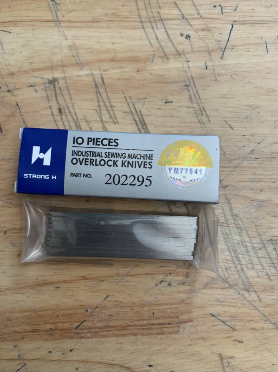 Dao dưới máy vắt sổ 202295