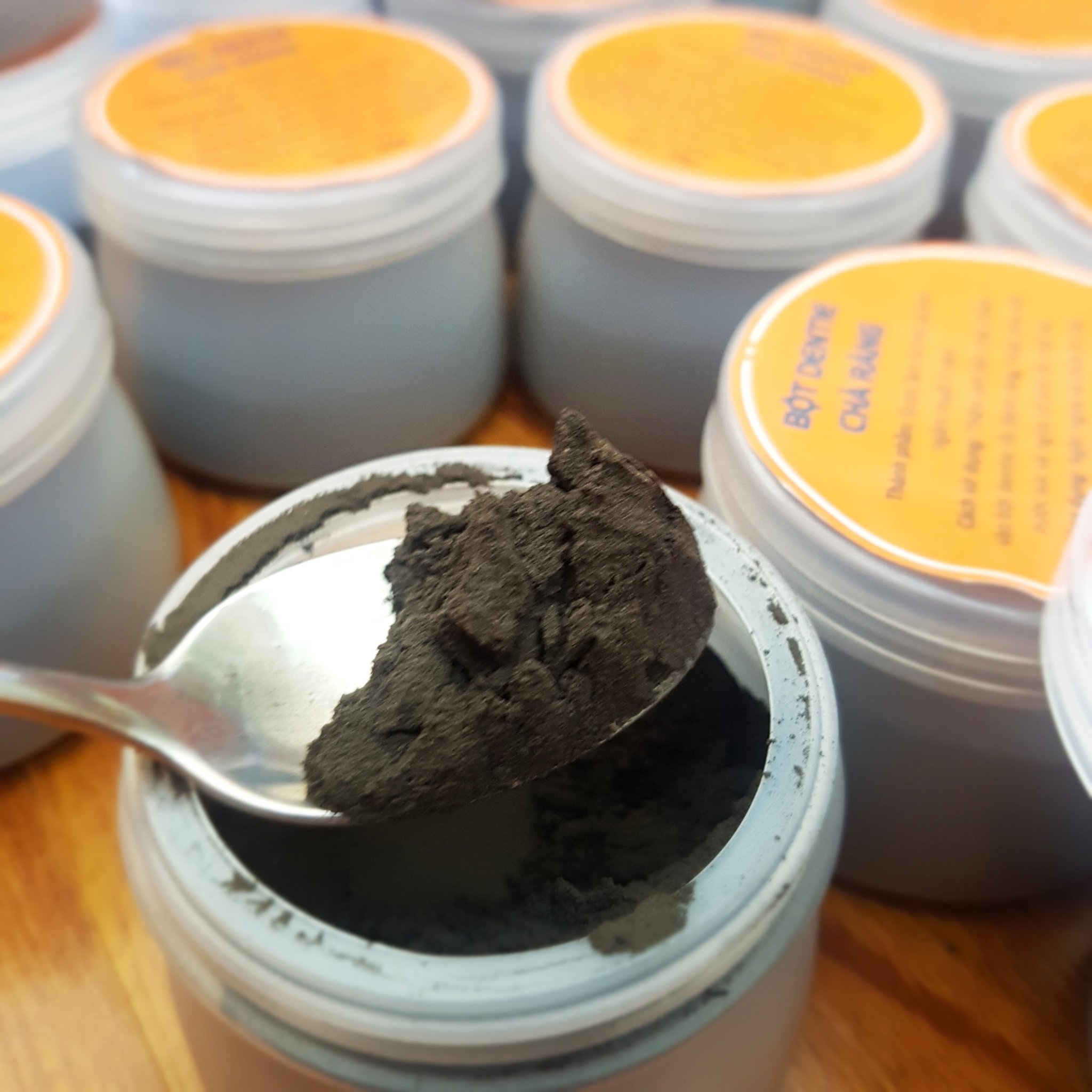 Bột chà răng dentie (100gr) bột than cà tím muối lâu năm