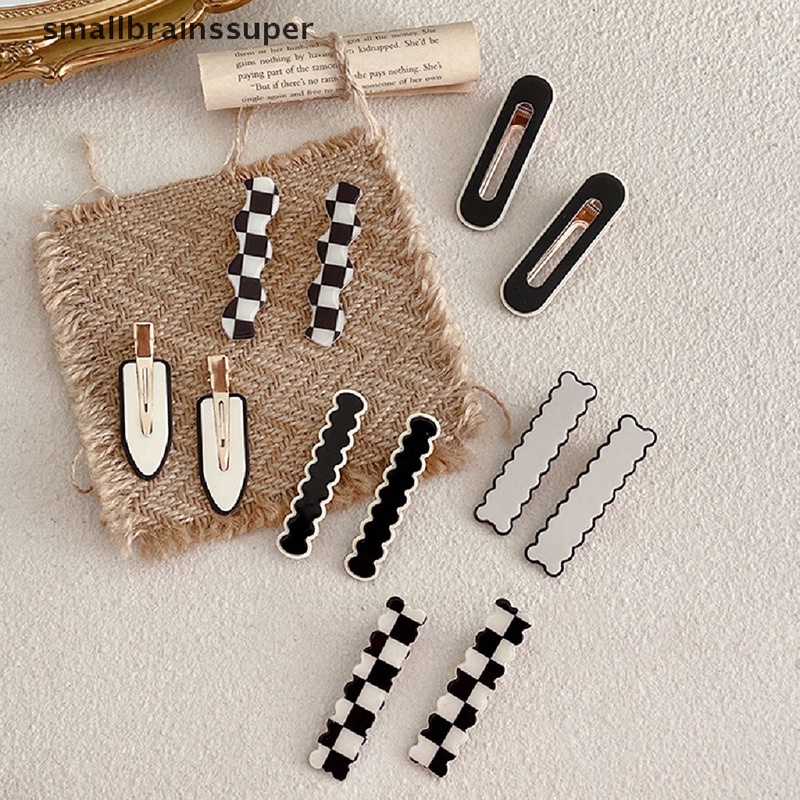 set 2 Kẹp tóc càng cua hình thật đen trắng