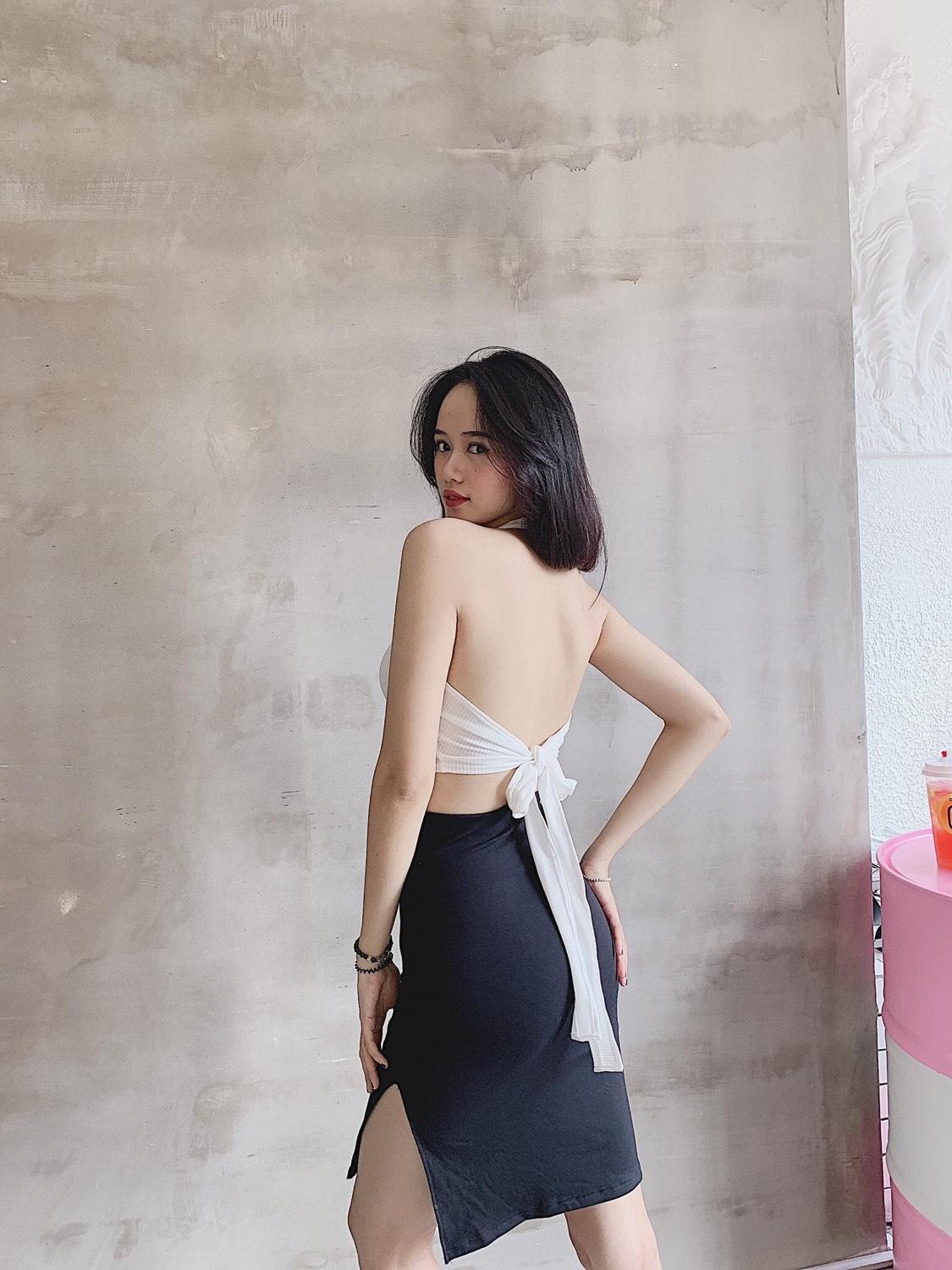 Chân váy thun ôm xẻ đùi form lửng