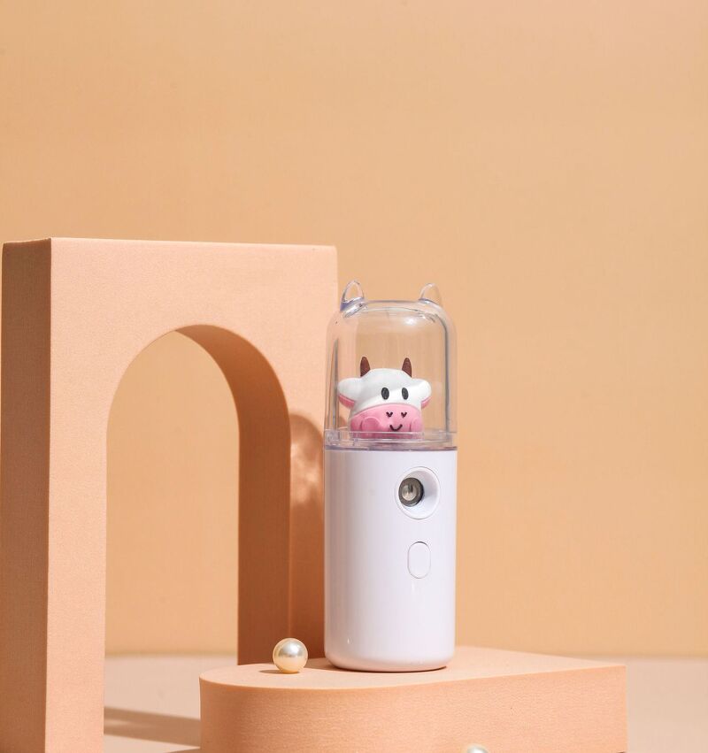 Máy phun sương mini cầm tay hình bò sữa