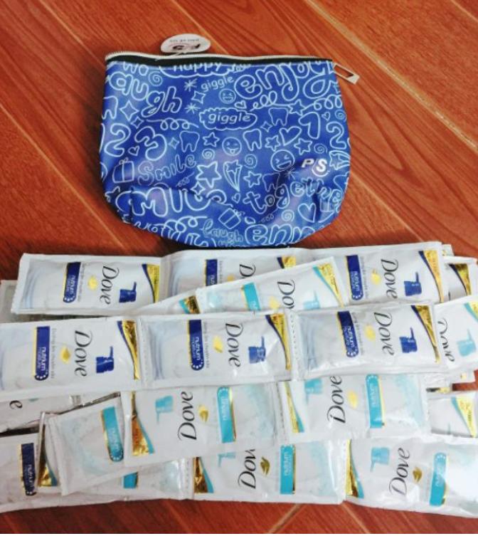 Set 50 gói sữa tắm Dove + ( tặng 1 túi tiện ích tùy mẫu )