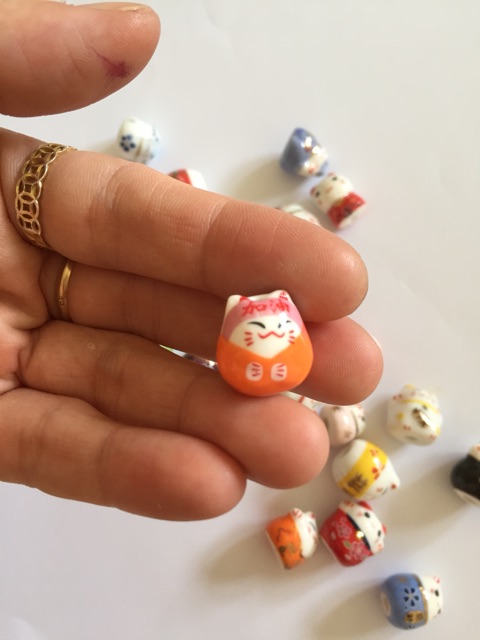 Mèo gốm thần tài đủ màu