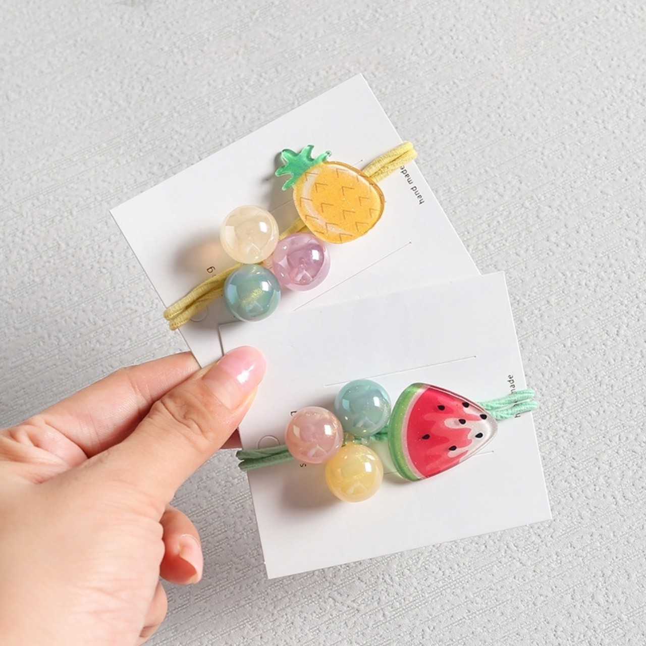 CỘT TÓC HOA QUẢ CUTE CHO BÉ