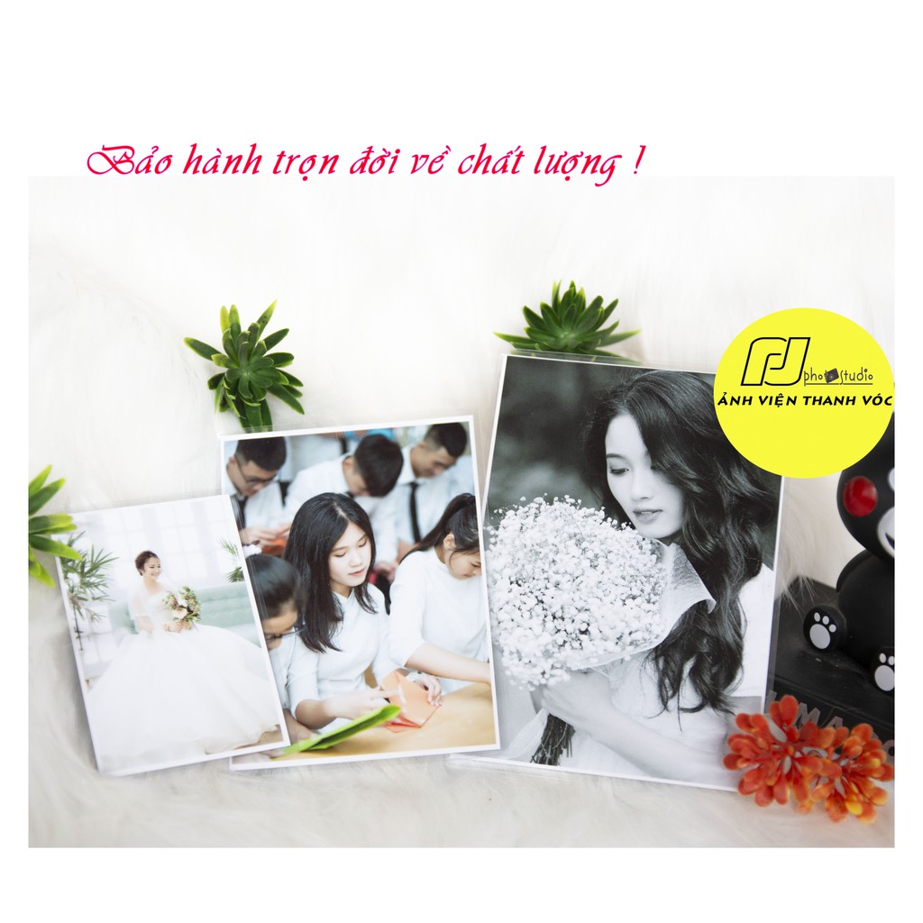 In ảnh 20x30( Bằng khổ A4) ép plastic tràn viền