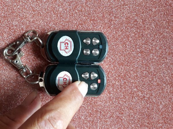 Remote cửa cuốn 365 mhz đèn đỏ Đa năng