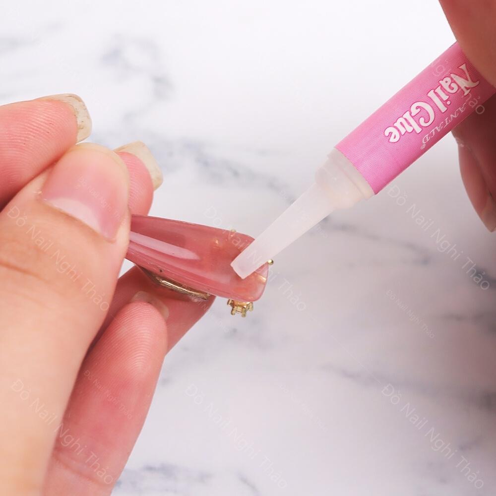 Keo dán móng mini nail box Nghi Thảo 2g