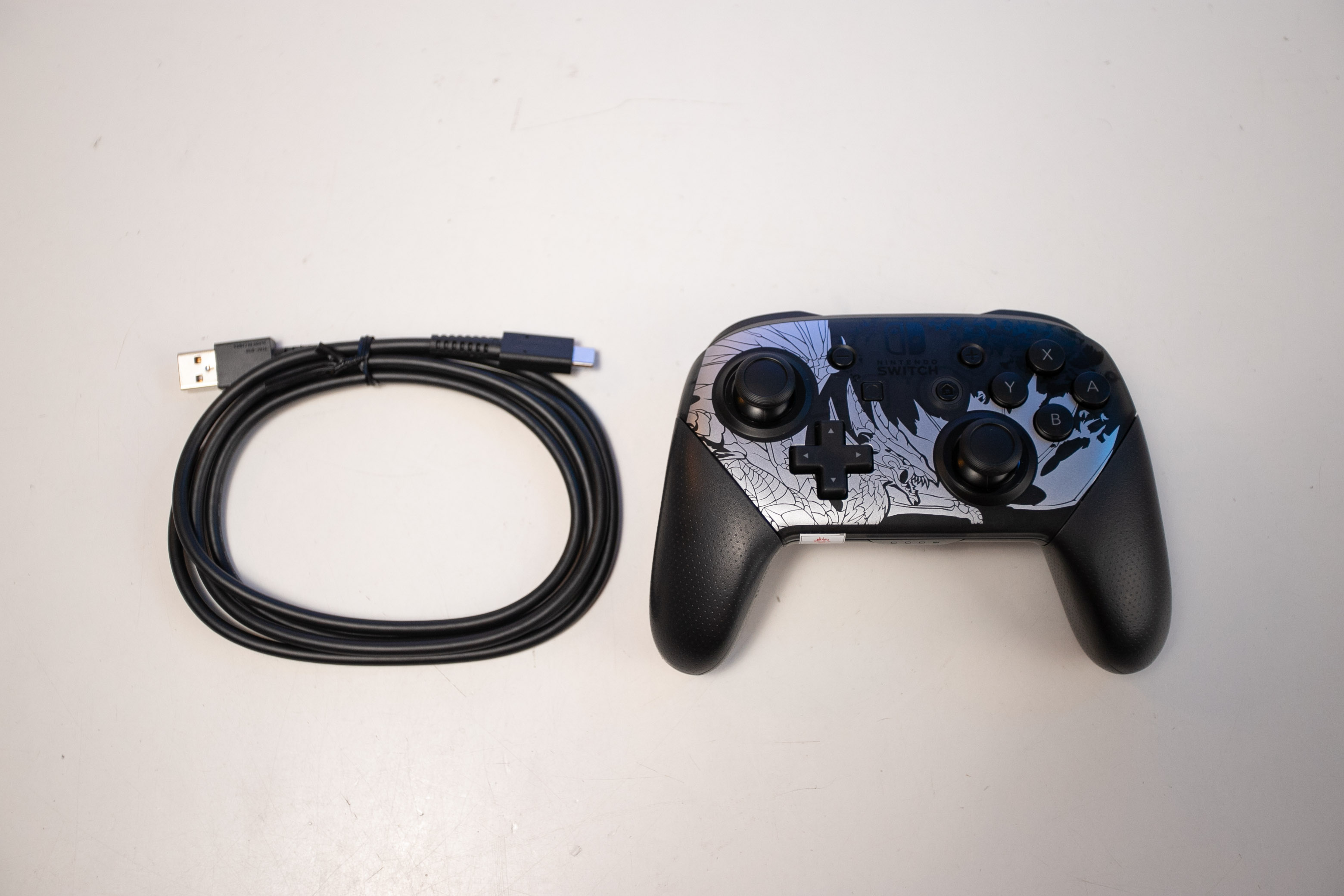 TAY CẦM CHƠI GAME KHÔNG DÂY NINTENDO SWITCH PRO CONTROLLER - MONSTER HUNTER RISE SUNBREAK EDITION