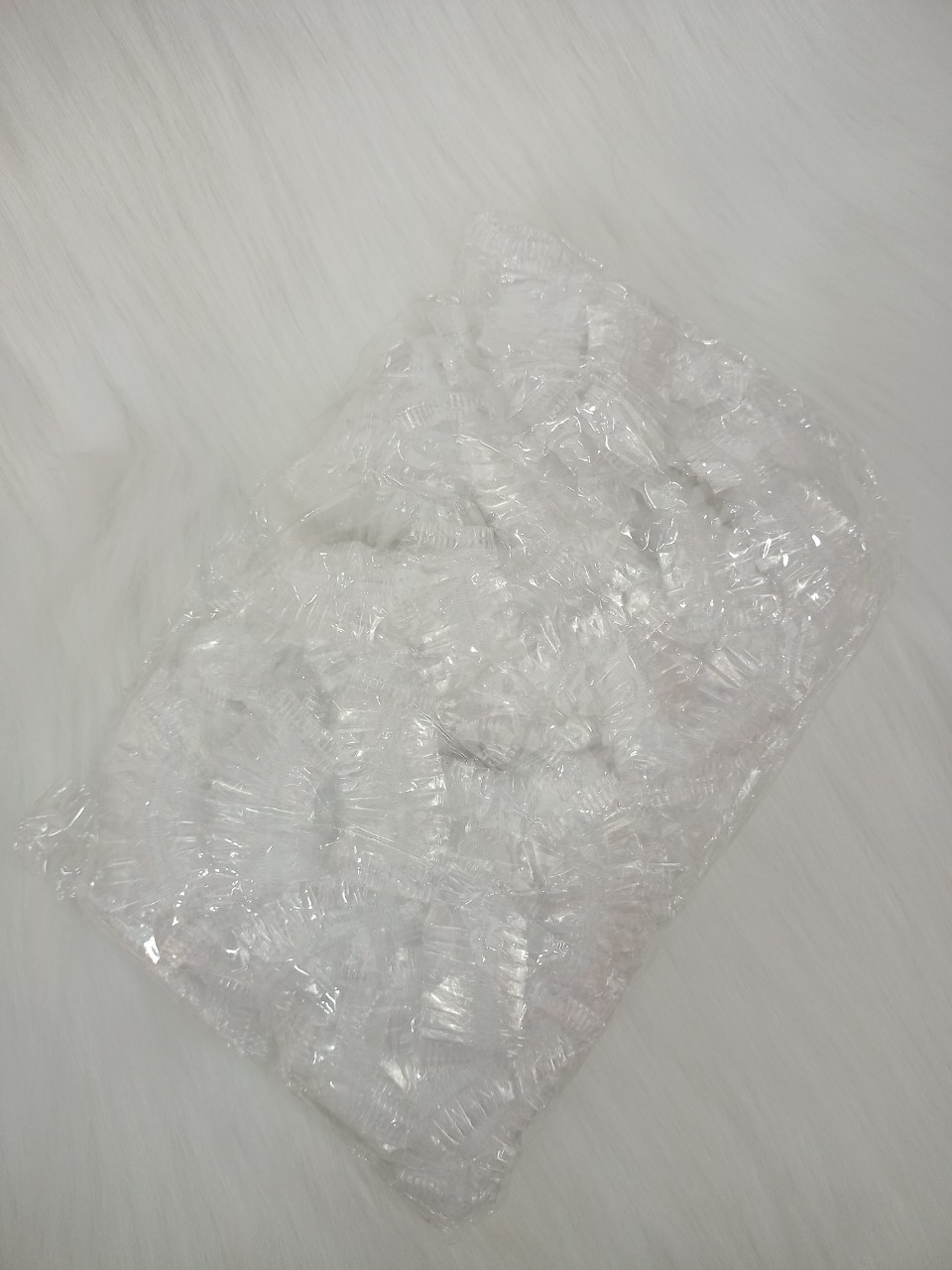 1 Bịch 100 chụp tai ni lông