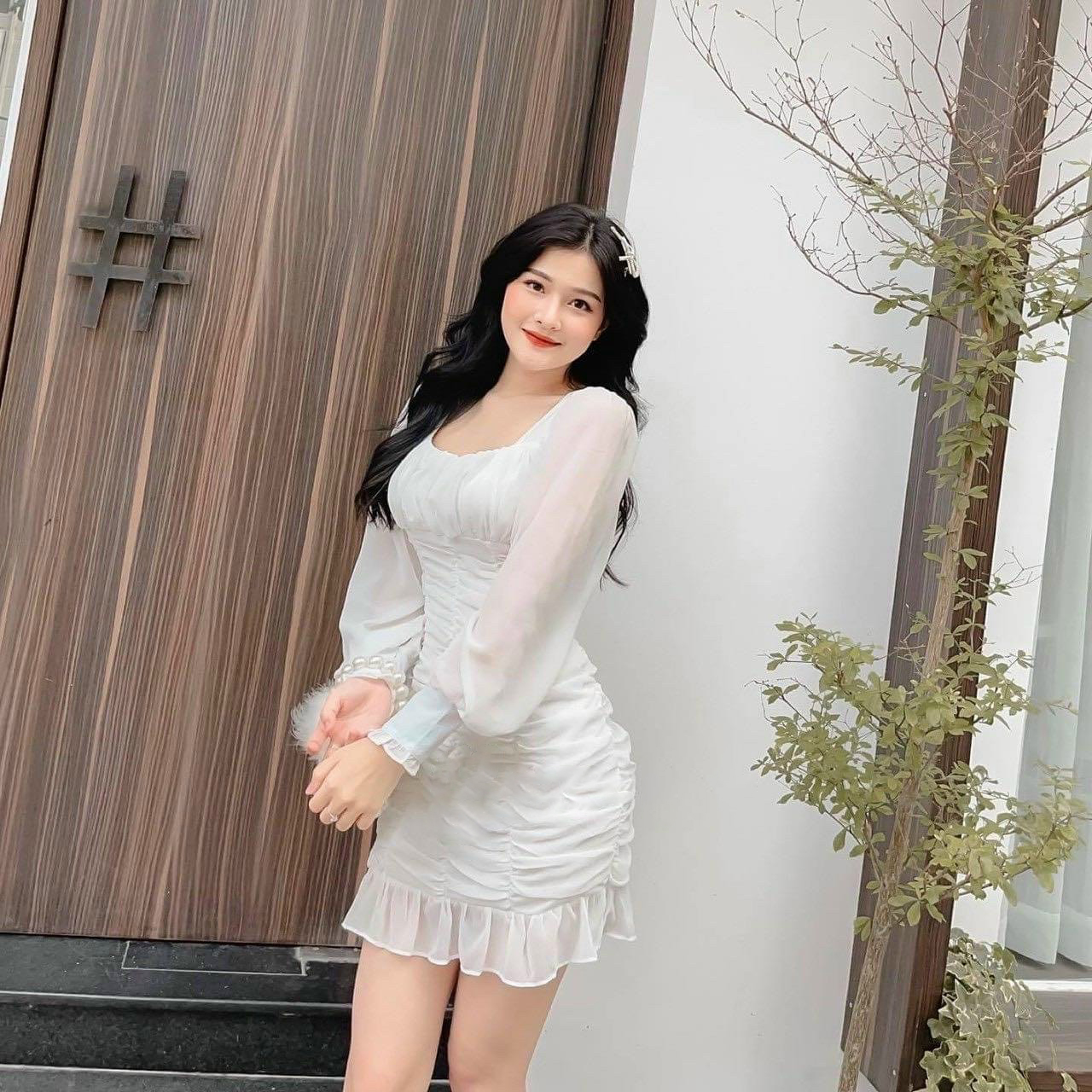 Đầm trắng tay dài tùng nhúng