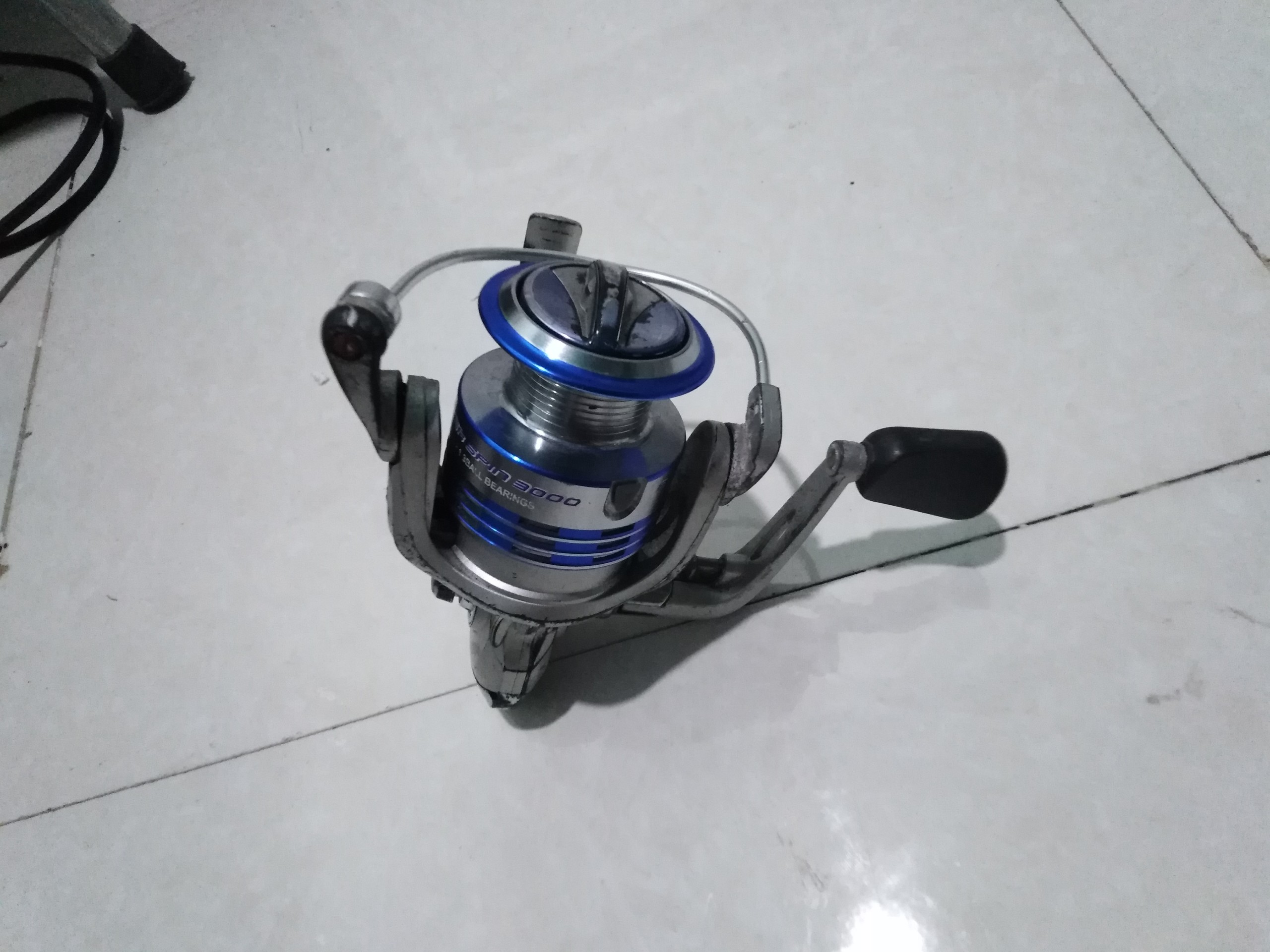 Máy câu bãi nhật Bluster spin 3000 cối kim loại