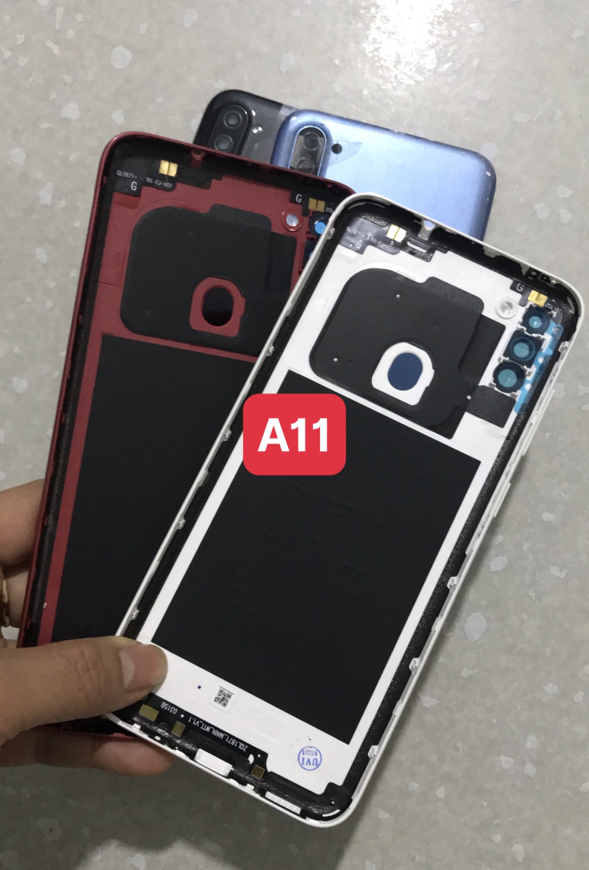 nắp lưng samsung A11 ( gồm lưng, phím bấm kính camera)