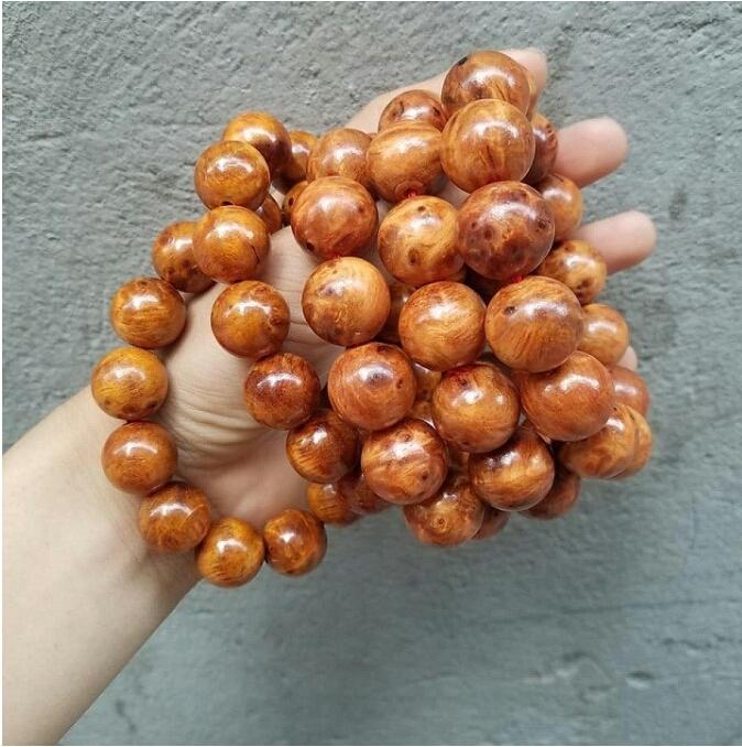 VÒNG TAY GỖ NU HUYẾT LONG 18LY