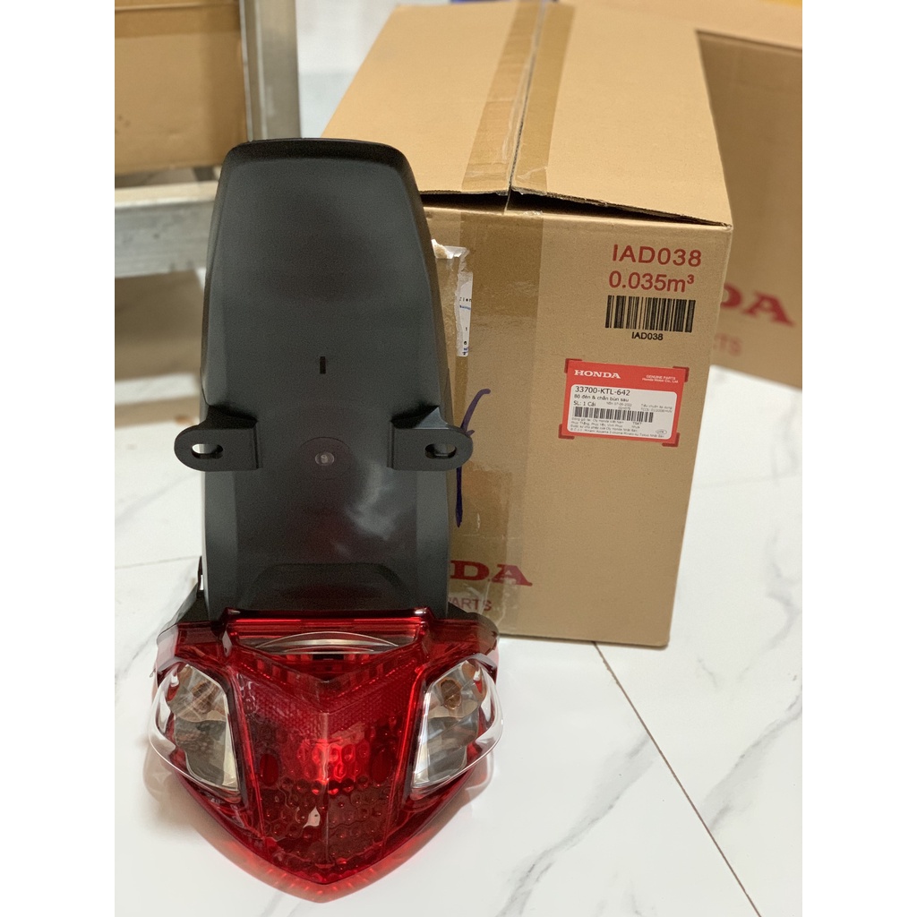 Bộ đèn và chắn bùn sau bắt biển số wave a, wave s,rs 100 có chụp đèn sau