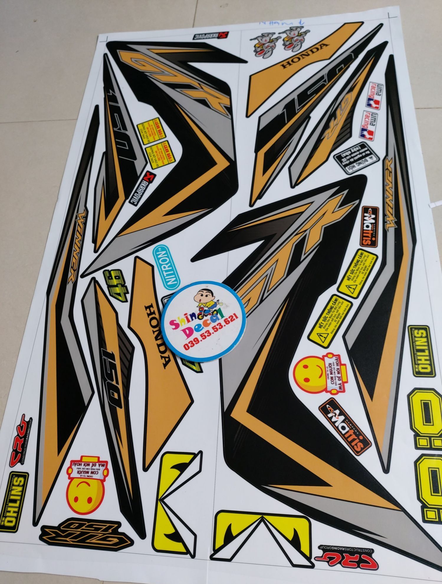Tem rời winner màu vàng đồng.