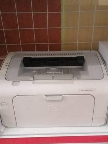 Máy in HP 1005 (cũ) còn khoảng 90%