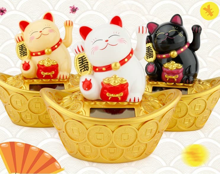 Mèo Ngoắc Ngồi Thỏi Vàng