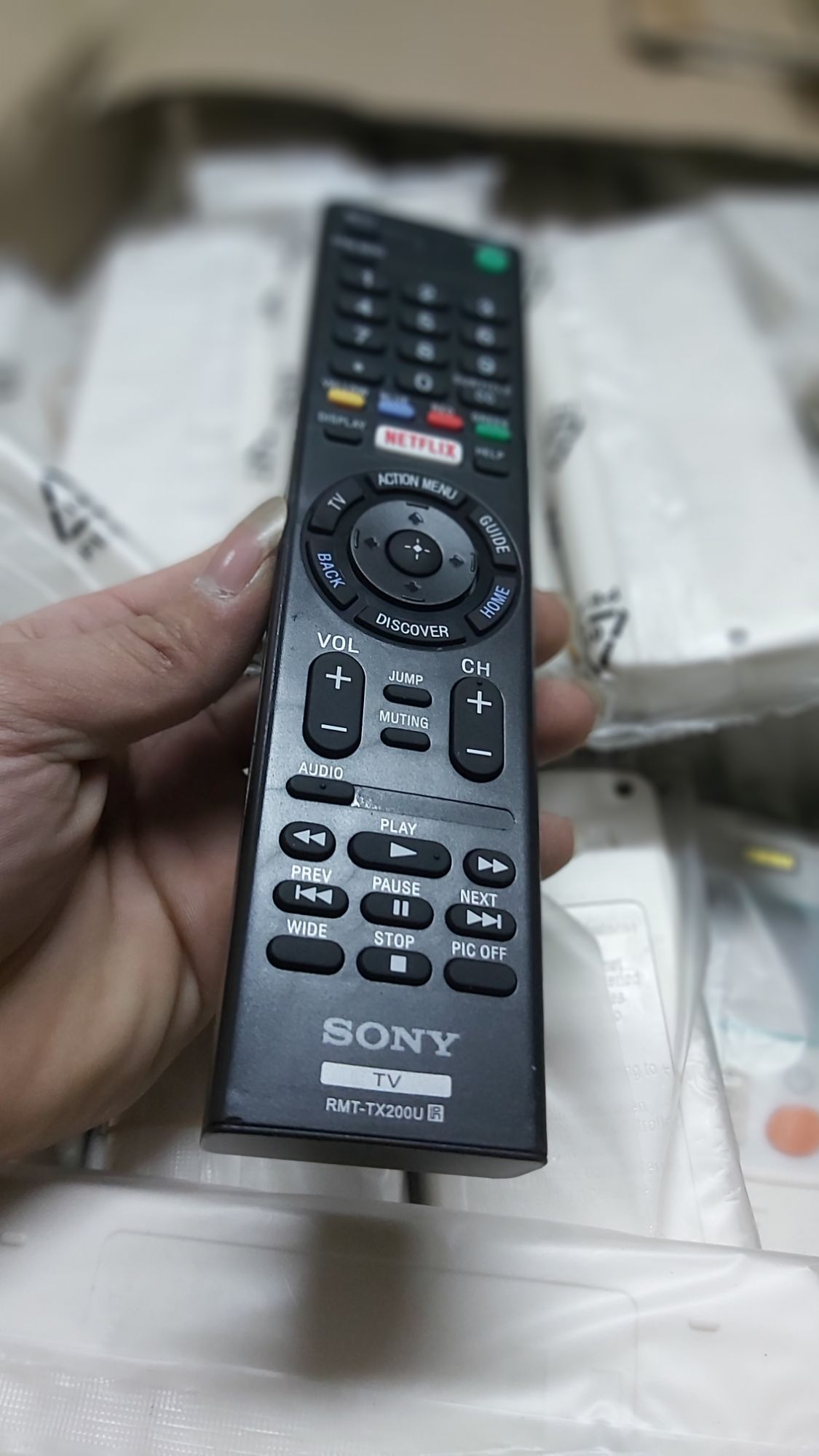điều khiển tivi sony tx200u zin