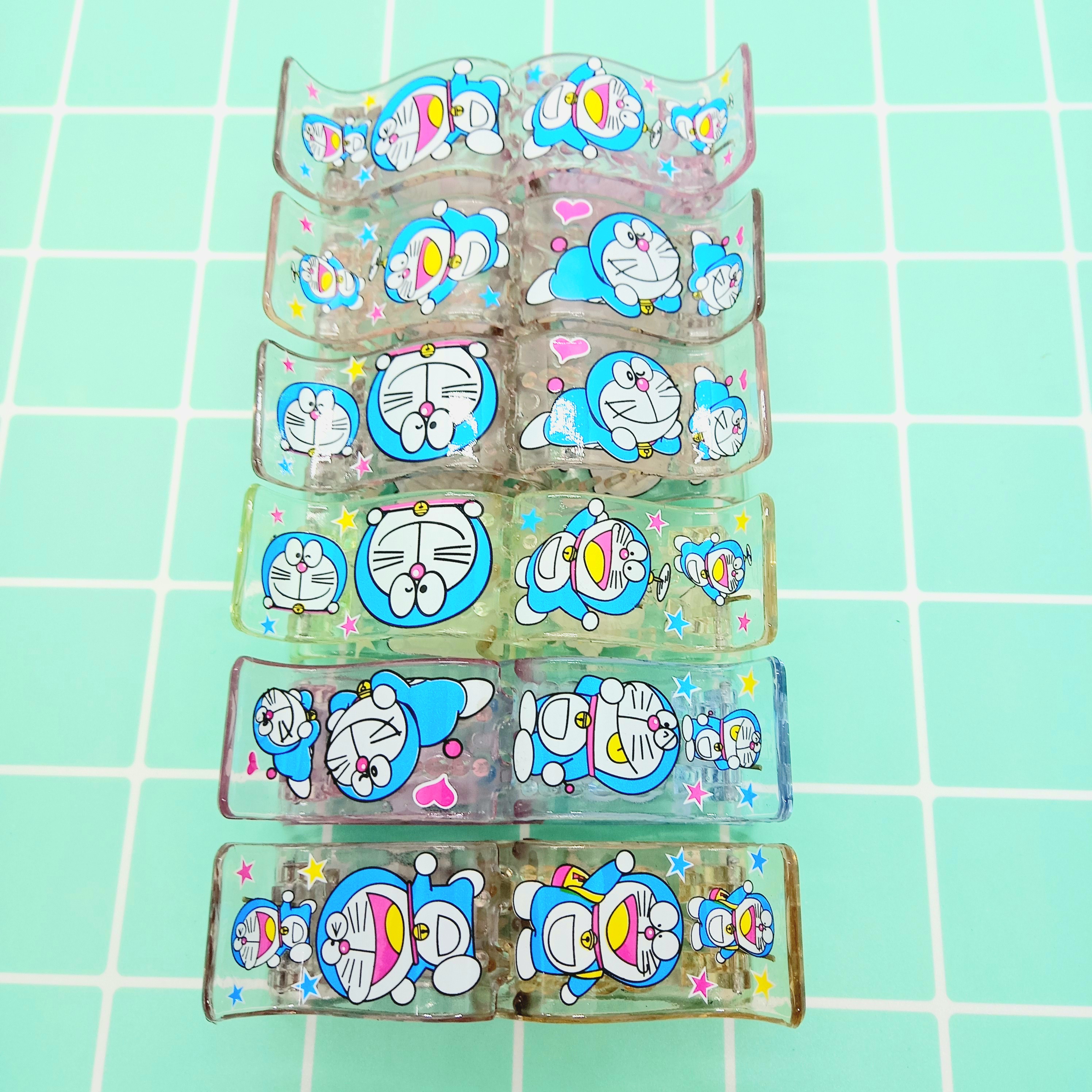 [HCM]Kẹp Càng Cua 5 Răng Trắng Trong Hình Doraemon