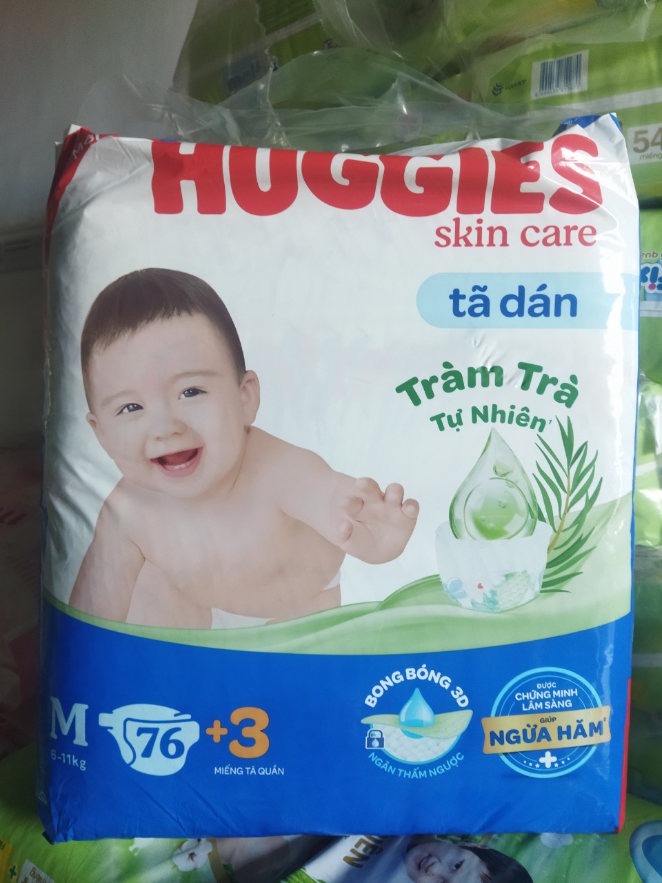 Tã dán huggies skin care bịch siêu đại size m76+3/l68