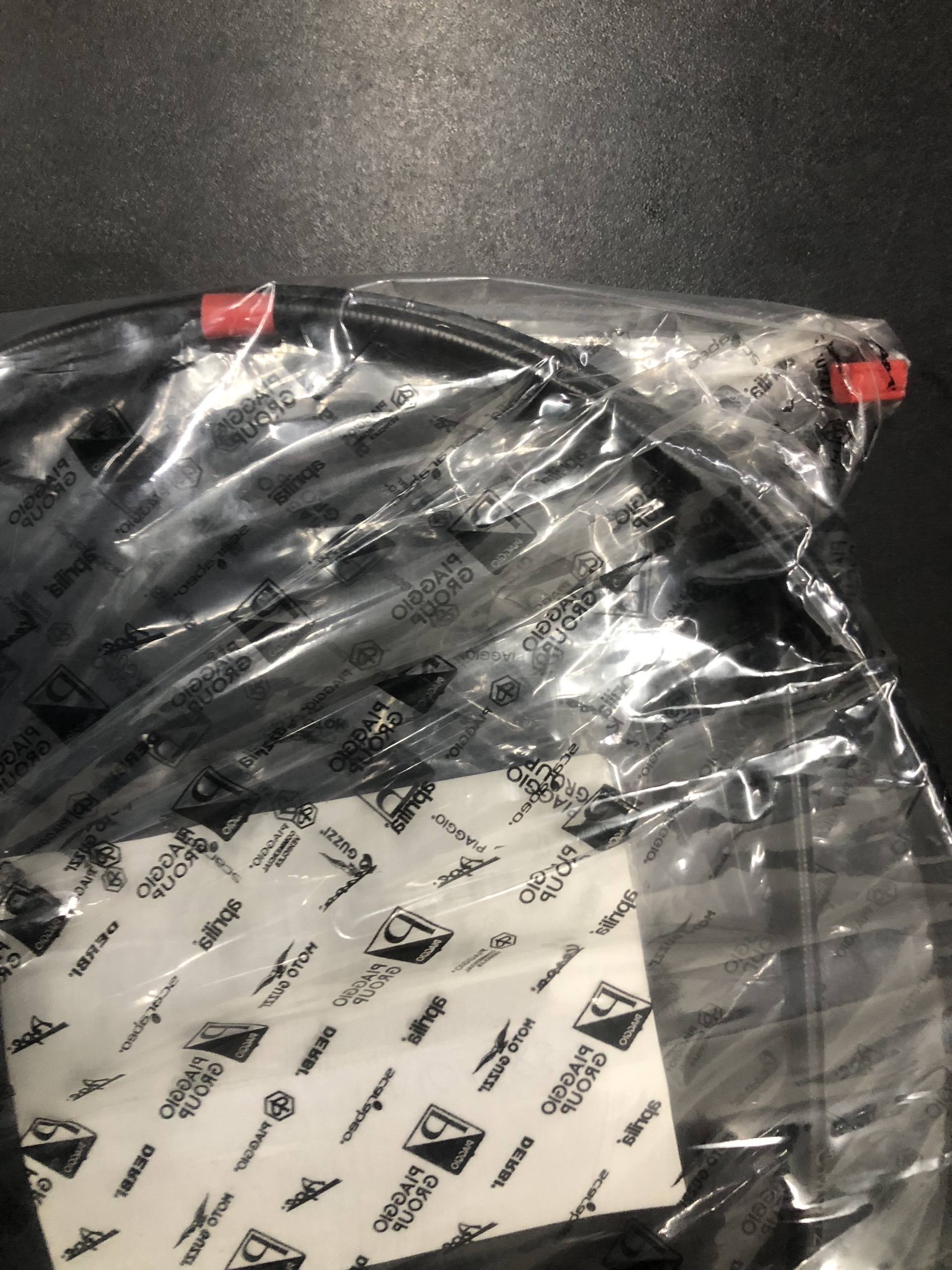 Dây cáp mở yên Liberty Piaggio