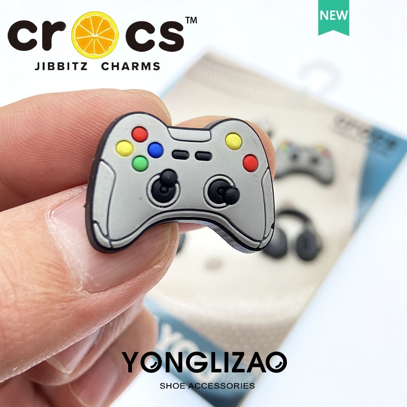 Jibbitz cross charms Nút jibbitz