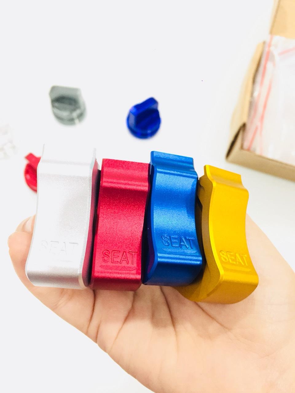 NÚM SEAT CNC BẬT MỞ YÊN CHO XE MÁY