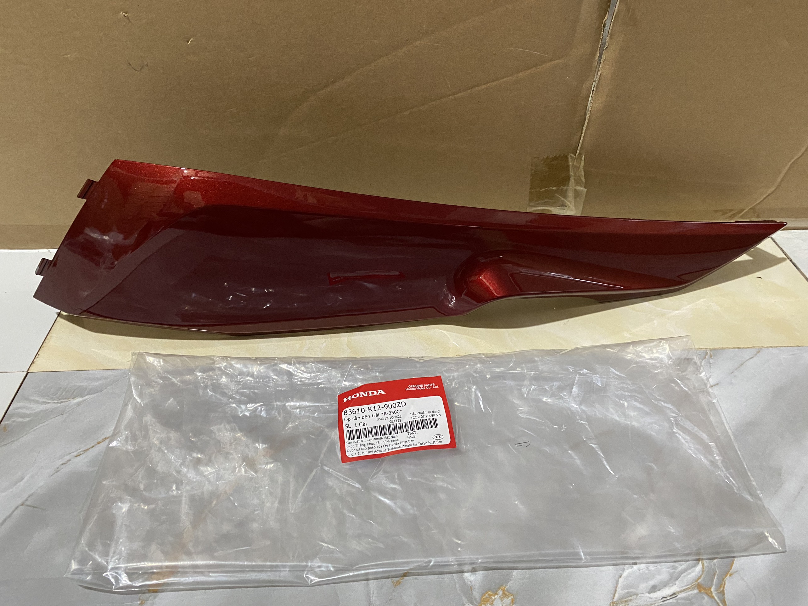 Ốp sàn bên trái lead 125 2013-2015 màu đỏ đô