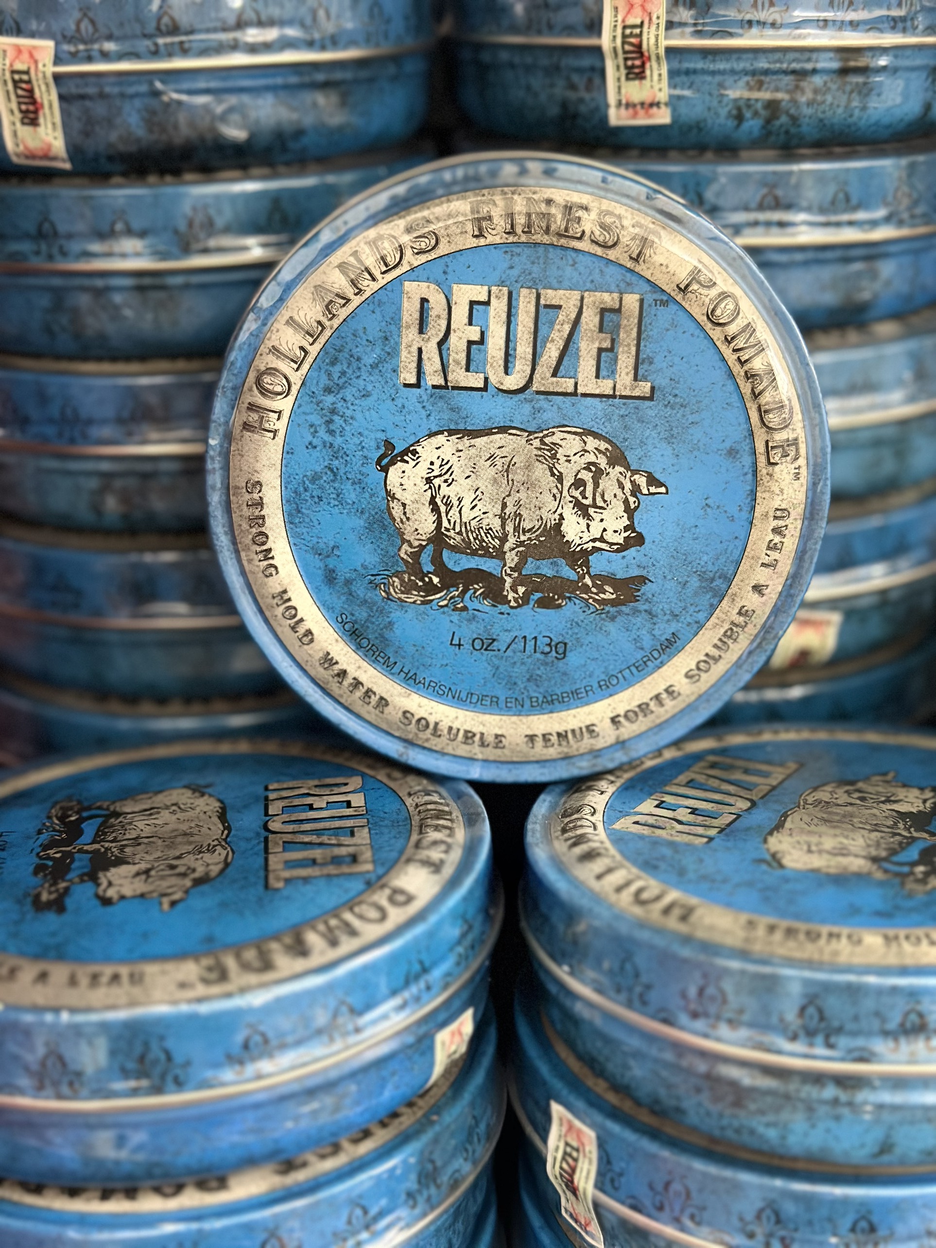 Sáp vuốt tóc Reuzel Blue Pomade chính hãng