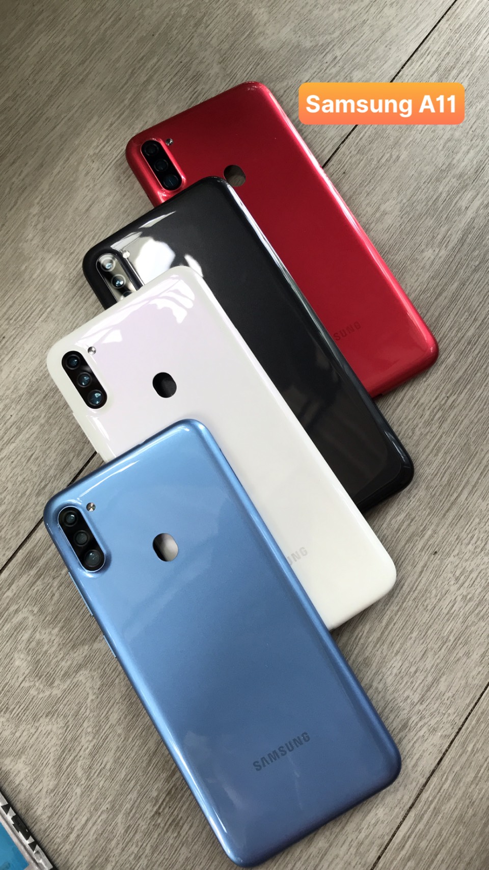 nắp lưng samsung A11 ( gồm lưng, phím bấm kính camera)
