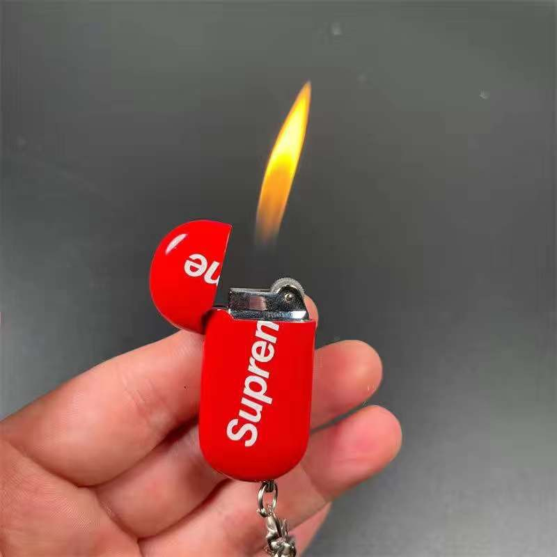 Hột quẹt bật lửa móc khóa SUPREME ga đá rãnh tay mini