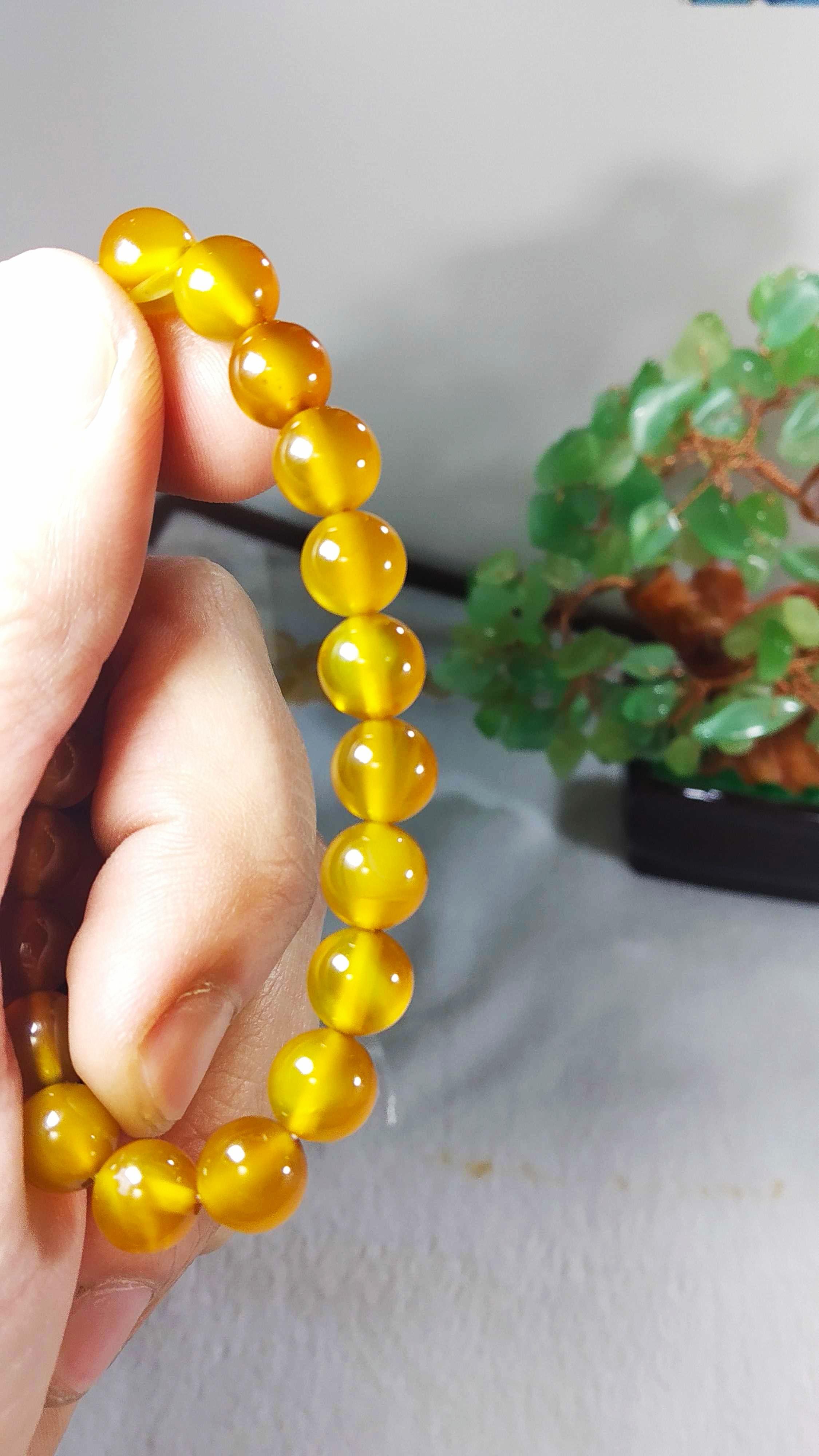 Vòng phong thủy-Vòng đá phong thủy vàng sẫm 8li