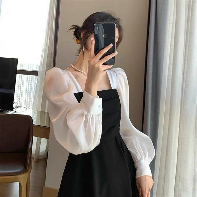 Đầm đen phối trắng tay dài