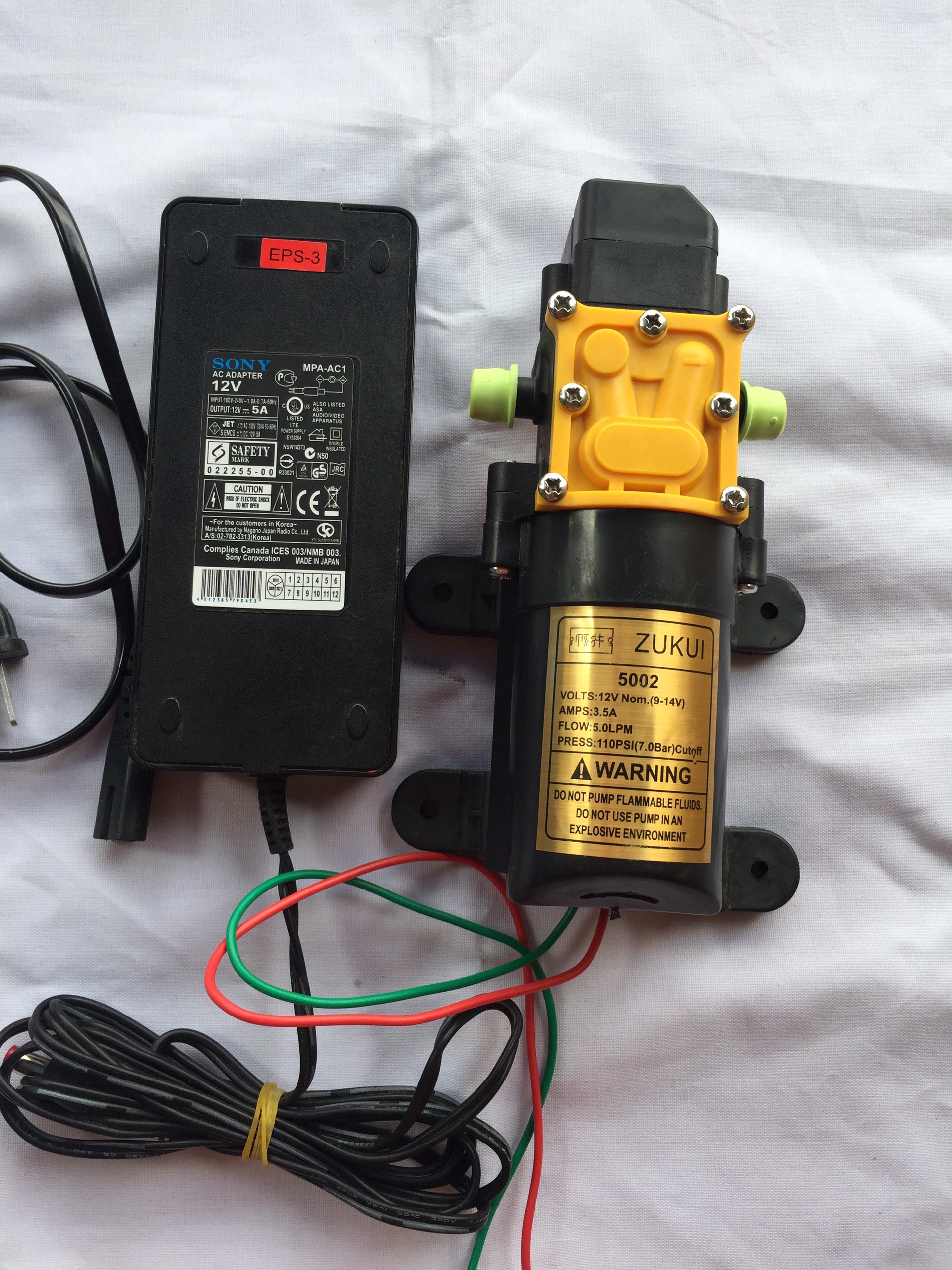 Máy bơm tăng áp MINI 12V ZUKUI kèm nguồn ADAPTER 12V5A lưu lượng 5L/ phút ứng dụng rộng rải trong phun sương tưới lan rửa xe...