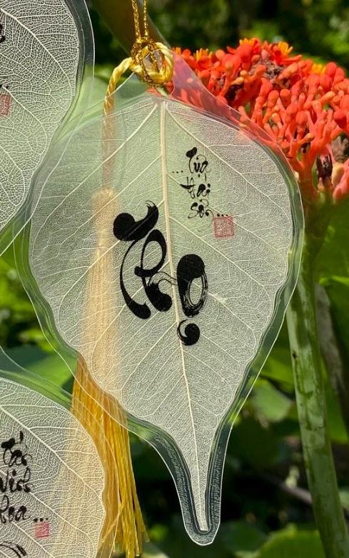 Lá bồ đề in chữ THỌ - TỰA THÁI SƠN