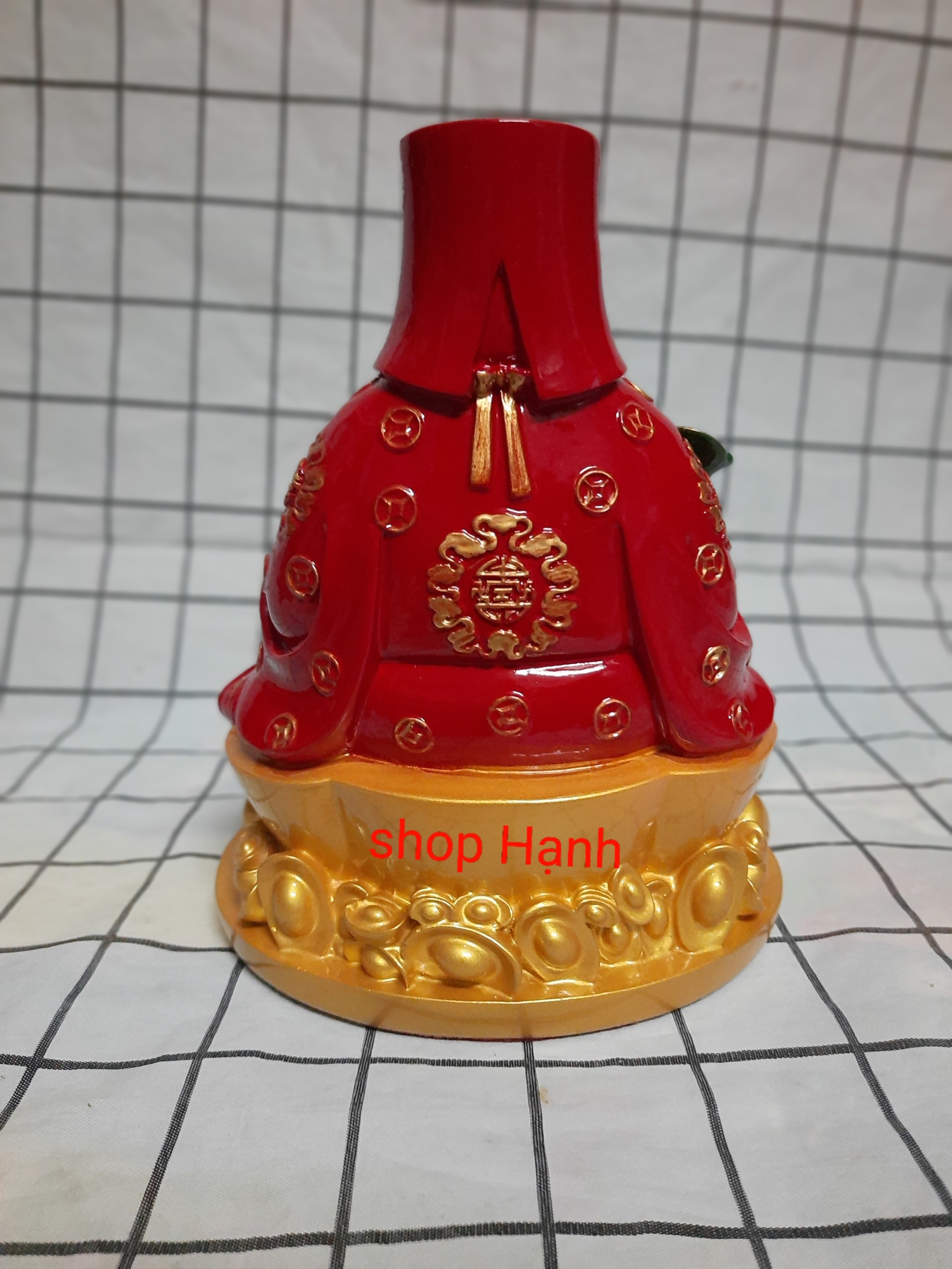 Ông Địa Thần Tài ngồi thỏi vàng đế tròn
